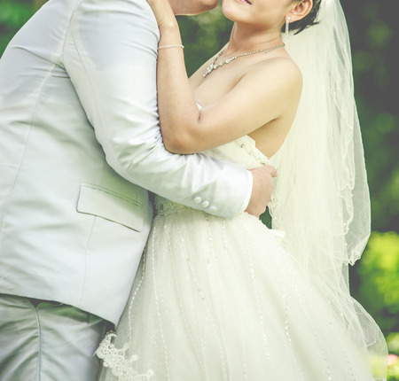 beautiful wedding couple is enjoying weddingの写真素材