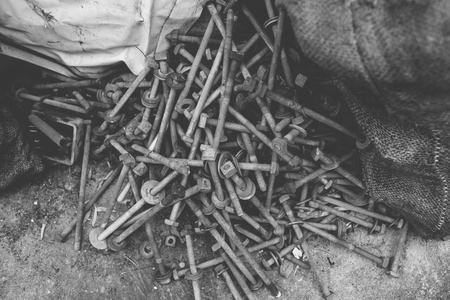 Group of old rusty bolts and nutsの写真素材