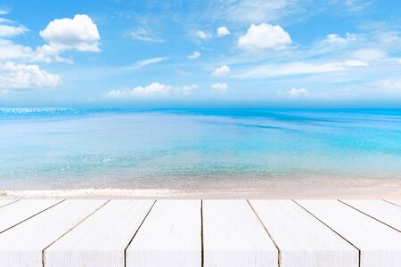 wooden floor with sea and sky blurred background,Summer background of free space for your...