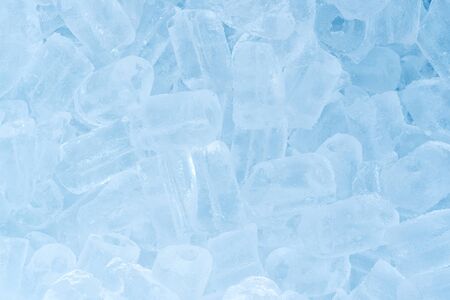 Ice cubes background.High angle view of heap of man made iceの写真素材
