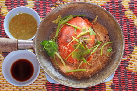Thai cuisine names. Crabs baking noodles and sauce.の写真素材