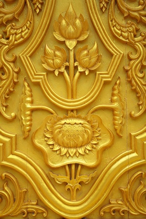 Lotus carvings on the doors of the temple の写真素材