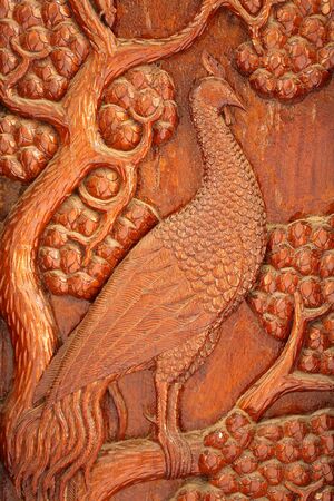 Animal carvings on the windows of the temple cult of Thailand の写真素材