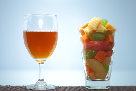 Fruits and juice in glass の写真素材