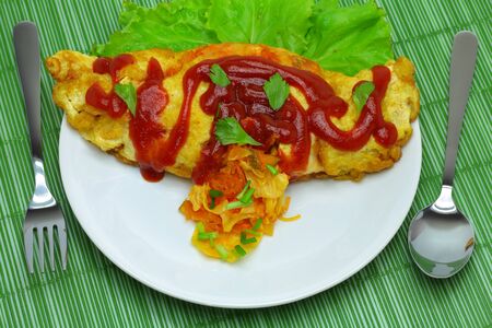 Omelet stuffed with spices の写真素材