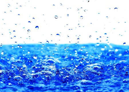 Water drops on the clear water の写真素材