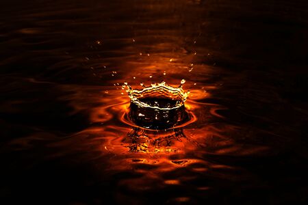 Water drops on the clear water の写真素材