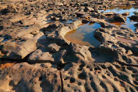 The rock in the Rapids の写真素材