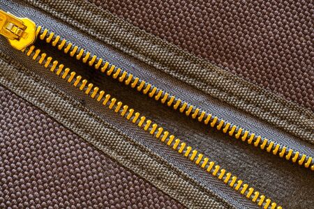 Close-zipper pockets on the black fabric の写真素材