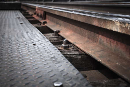 Close-screw on top of the rails の写真素材