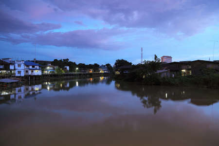 View of the old communities along the canal Chanthaburi at night.の写真素材