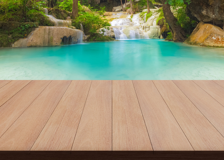Wooden deck in background waterfall in illustration 3d rendering.の写真素材