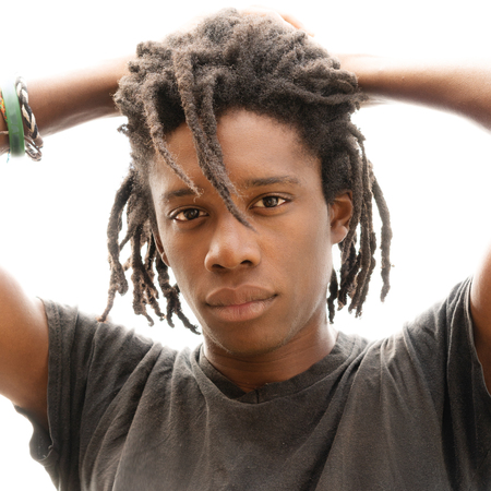 His masculinity is highlighted by strong features and firm postureの写真素材