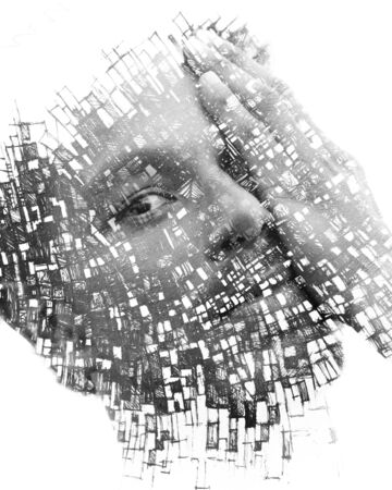 Paintography. Double exposure portrait of a man with strong features combined with handmade painting...