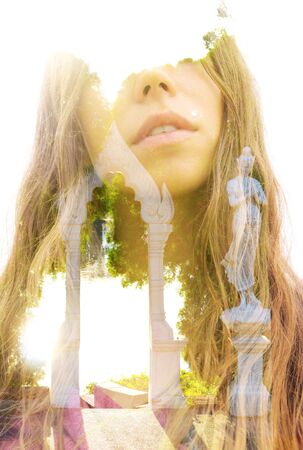 Double exposure of young female traveller combined with peaceful temple setting in southeast asiaの写真素材