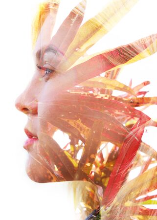 Double exposure with an ecological concept showcasing the beautiful femine nature of plantsの写真素材