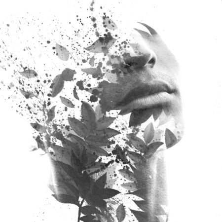 Paintography. Double exposure portrait of a man with strong features combined with handmade painting...