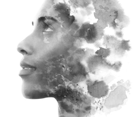 Paintography. Double exposure. Profile portrait photograph blends with hand made painting on white backgroundの写真素材