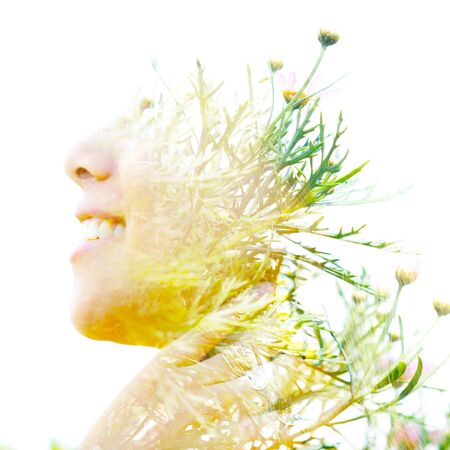 Double exposure profile portrait of a young, smiling natural beauty combined with beautiful small...