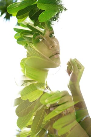 Surreal creative double exposure portraitの写真素材