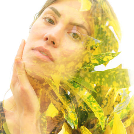 Young woman double exposure portrait with leaves