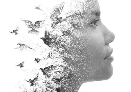 A surreal portrait of a womans profileの写真素材