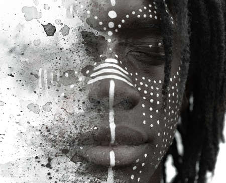 A portrait closeup combined with paint splashes and daubsの写真素材