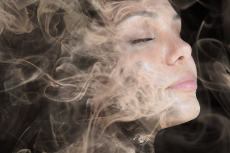 A dreamy feeling created by swirls of smokeの写真素材