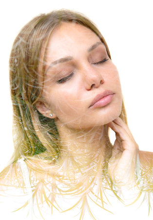 Youthfulness depicted in a portrait created with the double exposure techniqueの写真素材