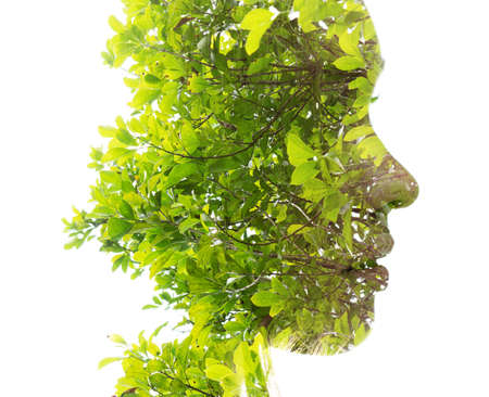 In harmony with nature. Double exposure portrait.の写真素材