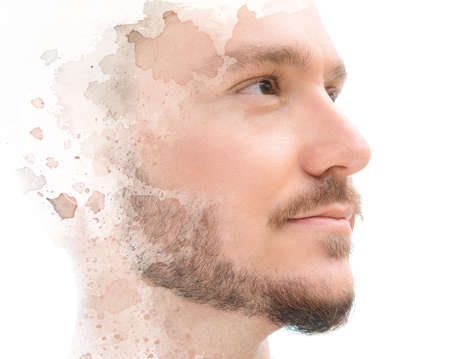 Paintography. Unique male portrait combined with splashes of inkの写真素材