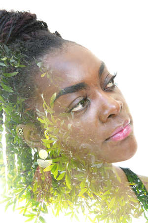Double exposure portrait of beautiful woman with a creative hairstyle