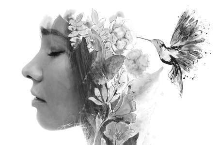 A black and white profile portrait of a woman with closed eyes combined with watercolor painting....