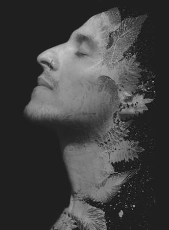 Dramatic paintography portrait against a black backgroundの写真素材