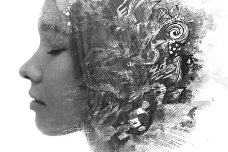 Paintography. A black and white profile portrait of a woman combined with abstract ink shapes.の写真素材