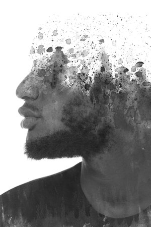 A profile portrait of a man combined with various ink splashes. Paintography
