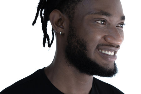 A portrait of a young man against a white background.