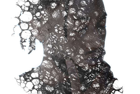 A portrait of a young man combined with black ink lines. Paintography.