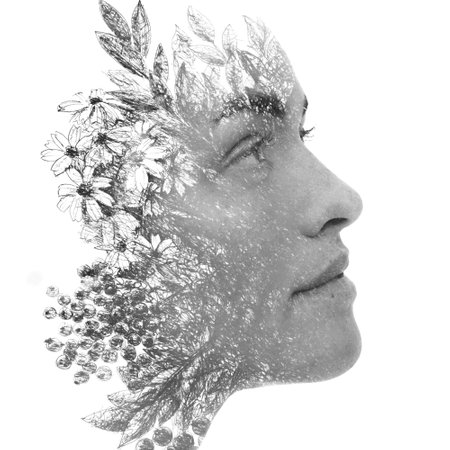 A portrait of a woman combined with an ink painting of flowers. Paintography.の写真素材