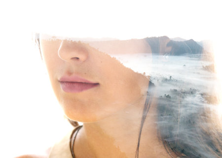 Mountains covered with fog combined with a portrait of a woman