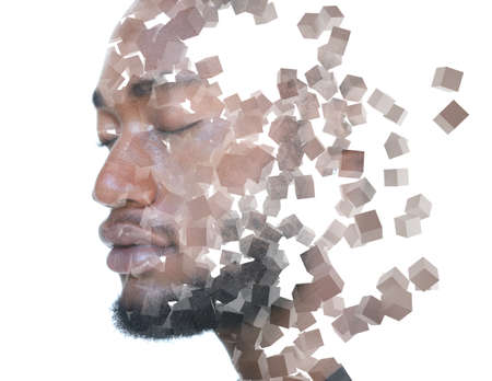 Multiple cubes floating in the air combined with a portrait of a young man