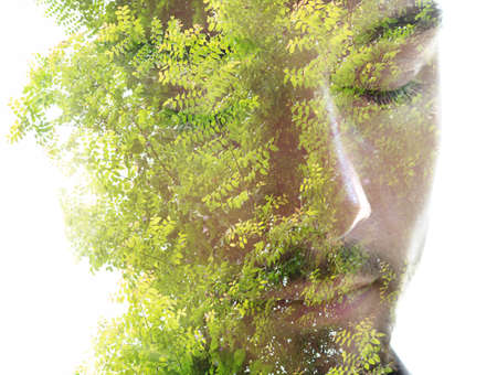 Vibrant tree merged with a portrait of a manの写真素材