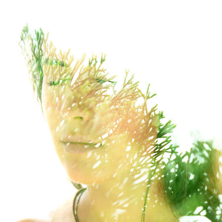 Merging with nature. Double exposure portraitの写真素材