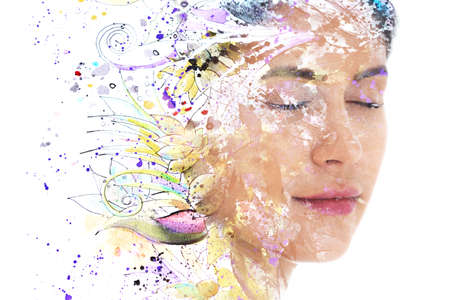 Paintography. A painting of flowers combined with a portrait of a womanの写真素材