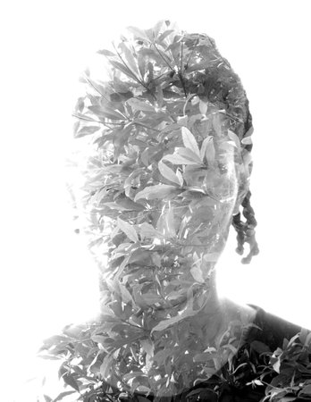 Black and white artistic double exposure portrait of a black man