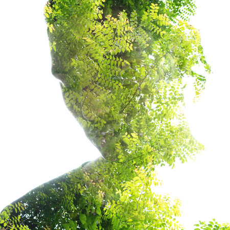 Double exposure portrait of a pensive manの写真素材