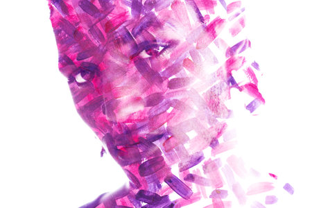 Paintography. A portrait of a young man combined with a vibrant paintingの写真素材