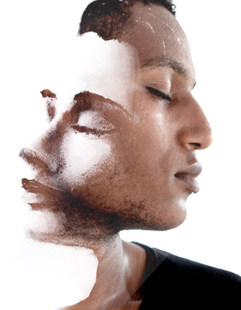 Paintography. A concept of a breakup depicted in a portrait of a young manの写真素材