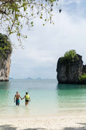 KRABI,THAILAND - JANUARY 19: Hong island on January 19,2016 in Krabi, Thailand. Couple in love relaxing on Koh Hong beach.のeditorial素材