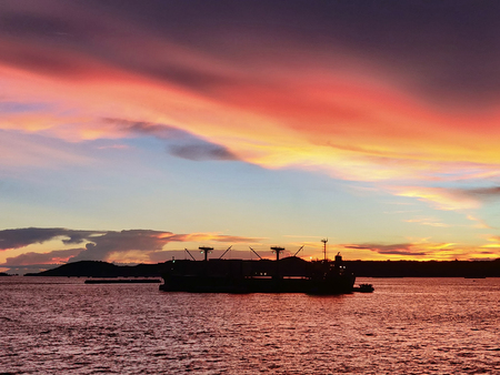 The bulk ship in anchorage, sunset, silhouette.のeditorial素材